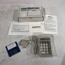 Vintage Genovation Parallel Micropad Clicky Number 1992-OPEN Box. Fixed Price $62.99.